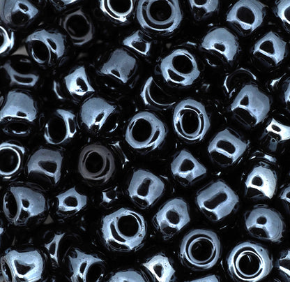 Close-up of black beads with a glossy finish